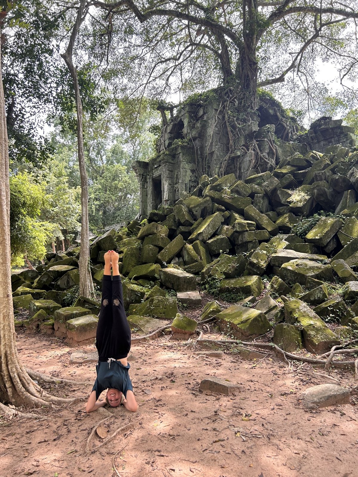 Ryen Toft headstand at temple ruins